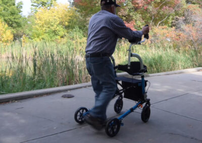 Man using A Better Walker outside